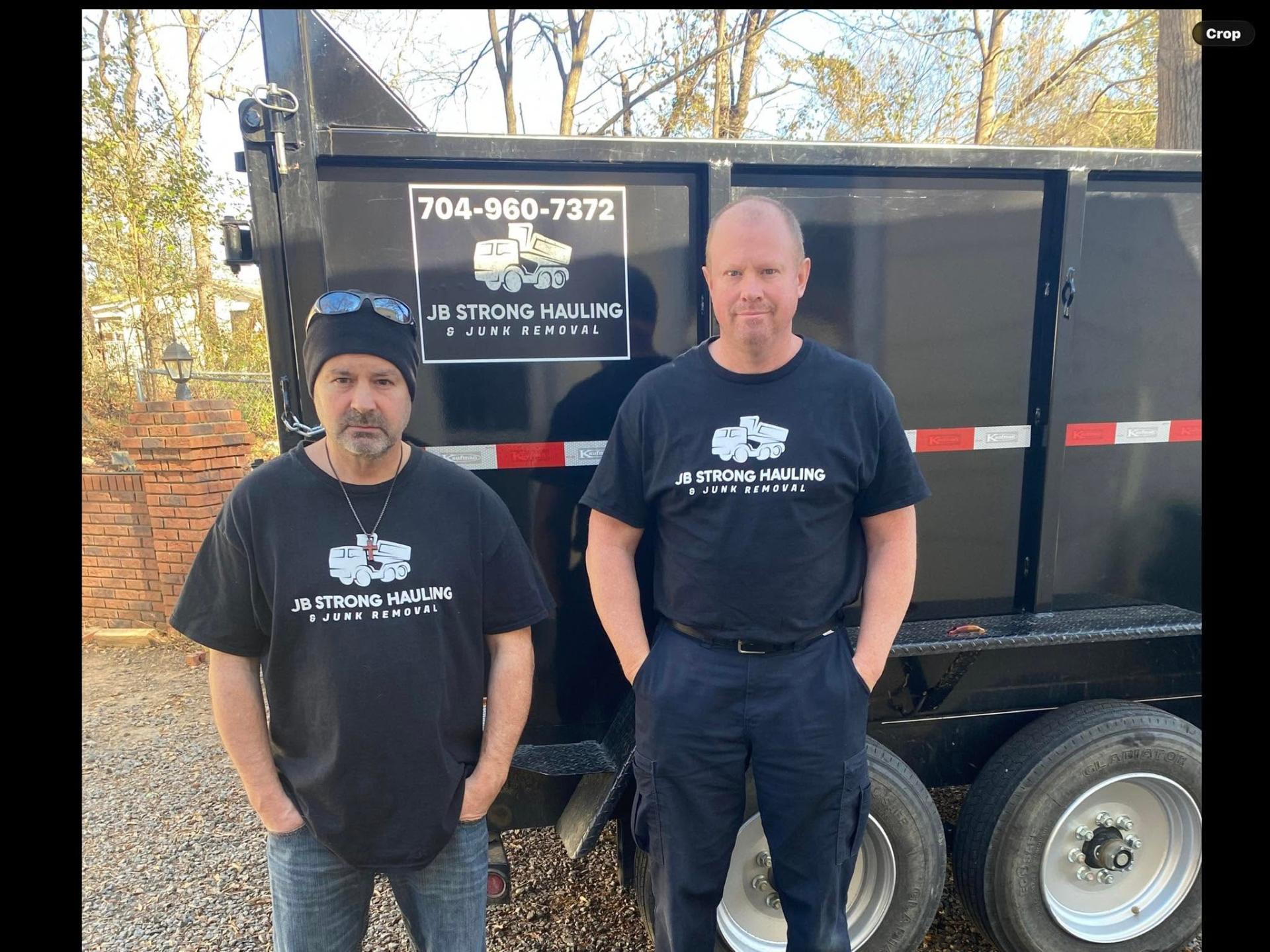 Jason and the JB Strong Hauling & Junk Removal team in front of their dump trailer in Concord, NC